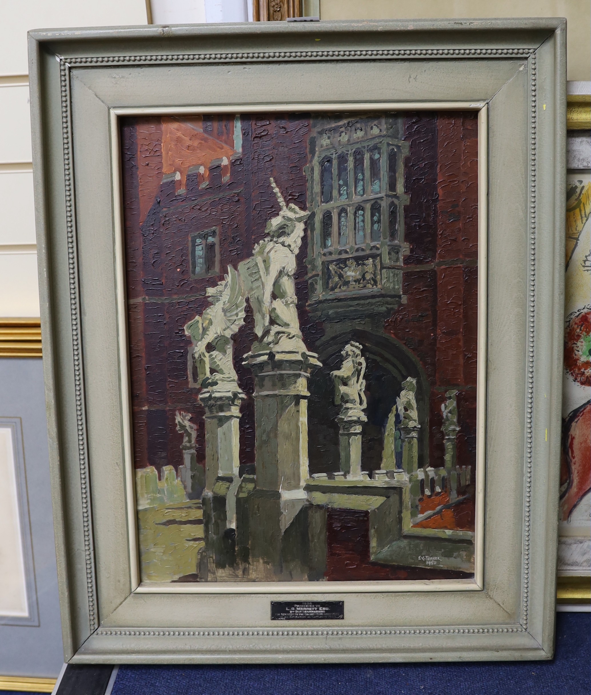 E.G. Turner (20th C.), oil on board, Gateway with heraldic statues, signed and dated 1952, with silver Old Grammarians presentation plaque, 48 x 35cm